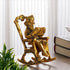 Lord Ganesha Reading Ramayana Statue Sitting on Chair
